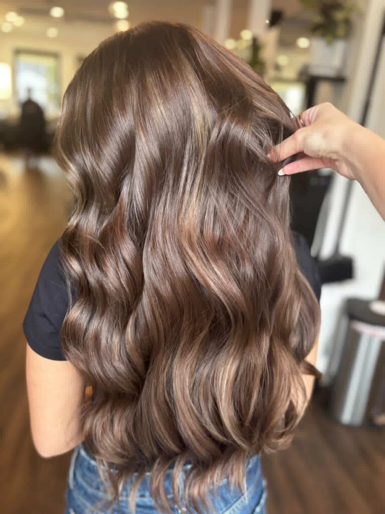 Brunette all over color with curls