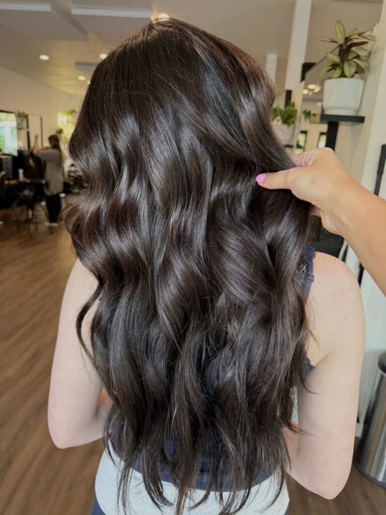 Dark brunette balayage with soft waves