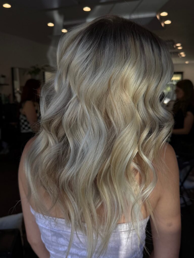Blonde balayage with textured waves